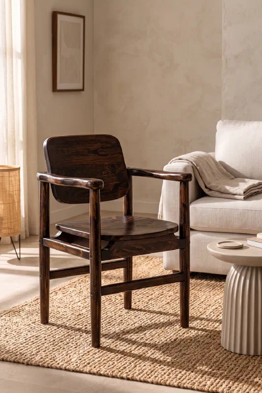Anchor your space with the Oel reclaimed teak chair