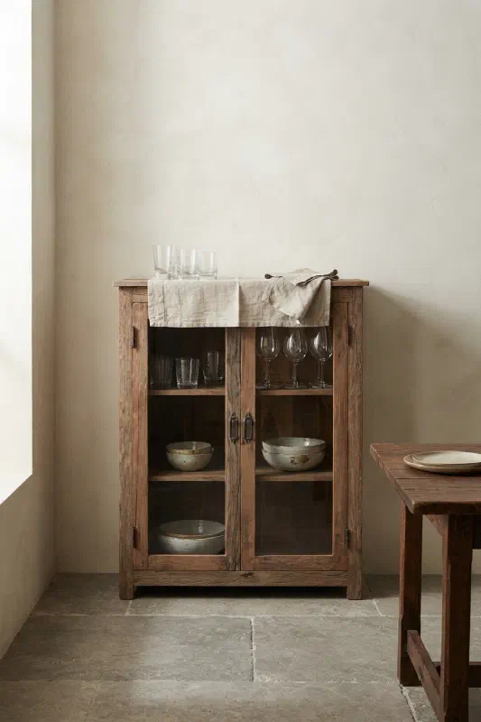 Dining room ideas: slim cabinet anchors a corner