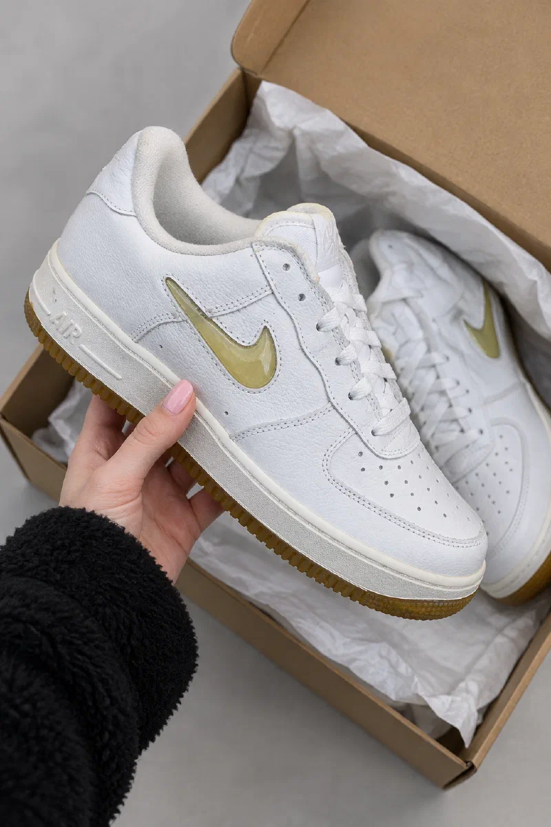 White Nike Air Force 1 sneakers with a clear Jewel Swoosh
